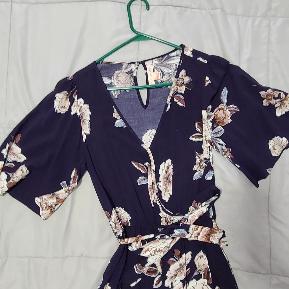 Adorable Navy floral jumpsuit with belt and pockets